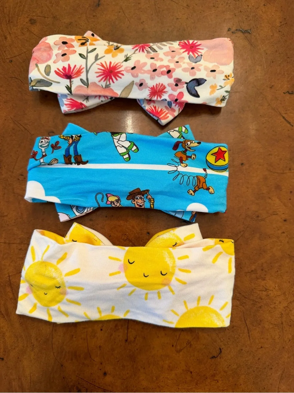 Little sleepies bow bundle sun, Toy Story and mauve meadow